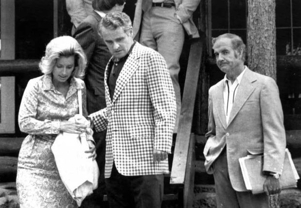 Thomas Eagleton helps wife down stairs as McGovern looks on